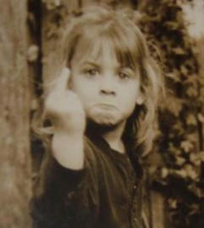 young girl giving the finger